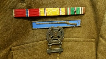 These are the bars and badges pinned to the jacket.